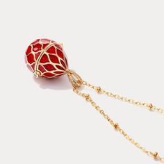 This Easter egg locket necklace is the perfect way to bring classic elegance and understated luxury to any outfit. Superbly crafted with a delicate and compact aesthetic, this timeless piece will become an essential part of your wardrobe. DETAILS Plating: 10K Gold Materials: 10K Gold on   Silver,   Cubic Zirconia, Enamel Size:   Length: 25.59"(65cm) + Extender: 3.94"(10cm) Weight: 4.42g Gold Necklaces With Detachable Pendant For Keepsake, Oval Locket Necklace With Detachable Pendant As Gift, Elegant Necklace With Detachable Teardrop Pendant, Elegant Gold Locket Necklace, Elegant Oval Locket Necklace For Gift, Elegant Oval Locket Necklace As A Gift, Elegant Gold Locket Necklace With Lobster Clasp, Luxury Oval Pendant Locket Necklace As Gift, Elegant Oval Pendant Locket Necklace As A Gift