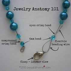 a blue beaded necklace with instructions for how to make it and what to put on it