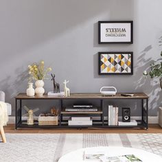 a living room scene with focus on the coffee table and vases in the corner