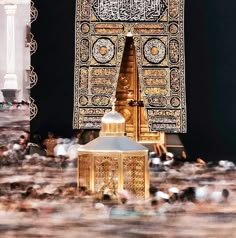 an elaborately decorated shrine in the middle of a large group of people around it