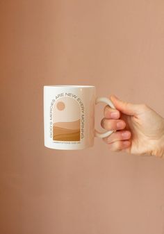 a person holding a coffee mug in their right hand with the words, there is no planet here on it