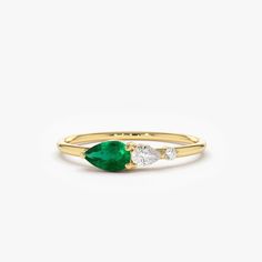 "Emerald Ring / 14k Gold Pear Shape Emerald with Pear Shape Diamond Ring / Tear Drop Emerald Ring / Promise Ring / May Birthstone Ring Item Details * Made to Order.  * Gold Kt: 14K Solid Gold * Custom Gold Color: Rose Gold, Yellow Gold, White Gold * Pear Shape Diamond: 1 Pcs 3x2 * Round Diamond: 1 Pcs 1.50MM * Pear Shape Emerald: 1 Pc 5x3MM * Total Diamond CTW: 0.10 ctw * Total Emerald Ctw: 0.20 ctw * Diamond Color-Clarity: G Color SI Clarity * Width of Band: 1.30MM * Setting Type: Prong * Ready to Ship in 7-10 Business Days If you have any additional questions about this ring, just hit the \"Ask a Question\" button (just to the right of the price) and we will get back to you within a few hours.  ▶ See more of our  Emerald Jewelry - https://etsy.me/3QCyZBQ ▶ See our storefront here - http: Pear-shaped Multi-stone Fine Jewelry Ring, Fine Jewelry Emerald Ring With Pear Gemstone, Yellow Gold Three Stone Pear-shaped Ring, Elegant Teardrop Multi-stone Rings, Pear-shaped Emerald Ring In Fine Jewelry Style, Pear-shaped Emerald Ring, Fine Jewelry, Fine Jewelry Yellow Gold Pear-shaped Ring, Pear Shaped Emerald Ring In Yellow Gold For Anniversary, Pear-shaped Yellow Gold Emerald Ring For Anniversary