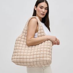 Elevate your style with our 'Elevate' tote, a harmonious blend of fashion and function. Crafted from premium nylon, this bag boasts a quilted design, offering a plush, tactile experience. Its spacious interior ensures all your essentials are stylishly stowed, making it a perfect companion for the wellness-conscious fashionista on the go. Embrace the uplifted essence of 'Elevate' as it takes you from office to yoga with effortless elegance. Item Type: Hobo Material: Nylon Closure: Zipper Exterior Exterior Details, Michael Stars, Effortless Elegance, Nylon Fabric, Trending Now, Hobo Bag, Sale Design, Interior Details, Quilting Designs