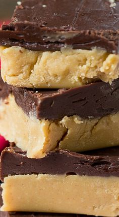 chocolate and peanut butter bars stacked on top of each other