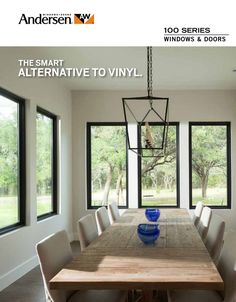 an image of a dining room table with chairs and windows in the background that says, the smart alternative to vinyl