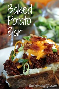 this baked potato bar is loaded with meat, cheese and other toppings on it