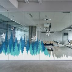 an office with frosted glass walls and snowflakes