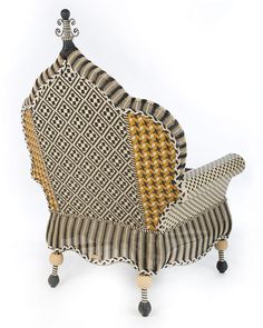 an upholstered chair that has been designed to look like it is made out of fabric