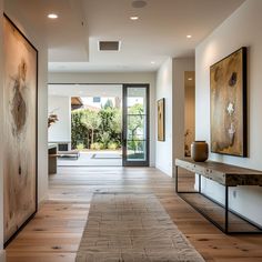 the hallway is clean and ready for us to use as an entrance way in this modern home