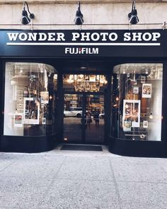 the front entrance to a photo shop