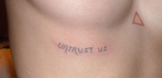 a woman's chest with the word us today written on it in cursive font