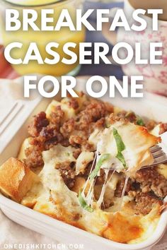 a casserole dish with meat and cheese in it