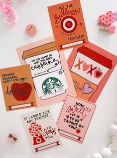 four different types of greeting cards on a white surface with pink and orange decorations around them