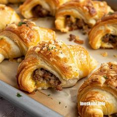 several pastries on a baking sheet ready to be eaten