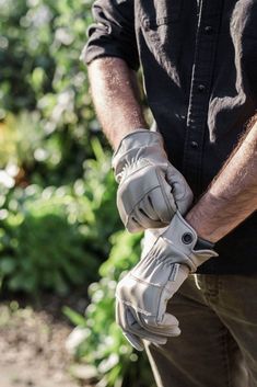 A step up from our Classic Work Glove, the Kunar Glove is an all-purpose glove for the garden, the workshop, and everyday wear in cold temps. Made from 100% premium cowhide leather, this work glove features an elastic cotton cuff for extra insulation and protection (no more woodchips sneaking into your glove while you work). Suede reinforcement panels over the middle and index fingertips supply abrasion resistance and support. Included copper grommet is perfect for hanging and easy storage. Leather Work Gloves, Garden Gloves, Gloves Design, Gardening Gloves, Unique Plants, Work Gloves, Medium Brown, Easy Storage, Mitten Gloves