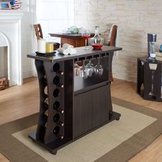 a kitchen island with wine glasses on it