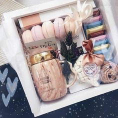 a box filled with lots of different types of soaps and other things in it