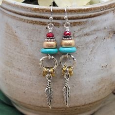 Mixed Metal Feather Earrings - Nicki Lynn Jewelry Affordable Bohemian Nickel-free Earrings, Metal Feather, Brass Rings, Rings Silver, Feather Charms, Wilmington Nc, Turquoise Howlite, Brass Ring, Gold Wood