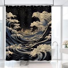 a bathroom with a shower curtain that has an image of waves in the night sky