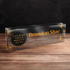 a clear acrylic box with an ad for brandon shae's photo here