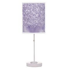 a purple and white table lamp with glitter on it