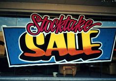 a storefront sign with the words strike sale painted on it's glass window