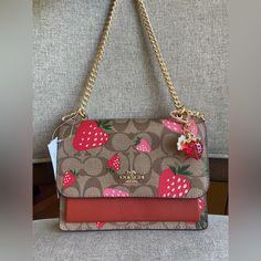 ***Come With Strawberry Charm/No Brand*** Mini Klare Crossbody In Signature Canvas With Wild Strawberry Print (Coach Ch521) Gold/Khaki Multi Coach Style # Ch521 | Signature Coated Canvas And Smooth Leather | Inside Multifunction And Zip Pockets | Snap Closure, Fabric Lining | Outside Open Pocket | Handles Convert To Shoulder Strap With 22" Drop | 7" (L) X 5 1/4" (H) X 2" (W)|Style No. Ch521| Strawberry Charm, Wild Strawberry, Wild Strawberries, Strawberry Print, Signature Canvas, No Brand, Smooth Leather, Coach Bags, 4 H