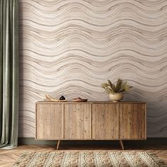 a wooden cabinet sitting in front of a window next to a rug on top of a hard wood floor