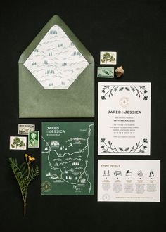 the wedding stationery is laid out and ready to be put into their guests'envelopes