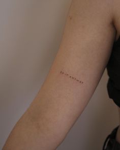 a woman's arm with the word do it anyway written in cursive font