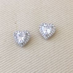 Beautiful Silver Plate Earrings Lab Created Diamond Cz Halo Setting Arrives In Gift Box. Hearts Are Approx 1/4”. Bail Approx 1/4”. Stem Approx 1/2”. New. Make An Offer. Make A Bundle. Tags: Heart, Post, Stud, Cz, Halo, Bling, Elegant, Love, Diamond, Princess, Engagement, Anniversary, Gift. Heart Cut Sparkling Stones Earrings As Gift, Heart Cut Sparkling Stones Earrings For Gift, Anniversary Heart Cut Sparkling Stone Earrings, Plate Earrings, Diamond Princess, Halo Stud Earrings, Halo Earrings Studs, Heart Diamond, Halo Setting