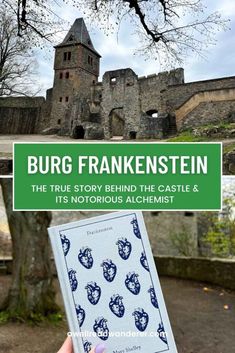 a person holding up a book in front of an old castle with the words, burg