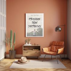 a living room with an orange wall and wooden furniture