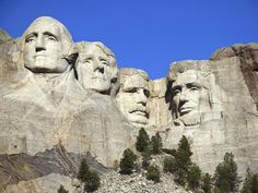 an advertisement for mount rushmore with the faces of abraham lincoln, thomas jefferson and george washington