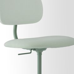 an office chair with a green seat and back rest on a metal base, against a white background