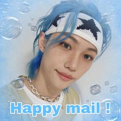 a girl with blue hair wearing a white and black headband that says happy mail