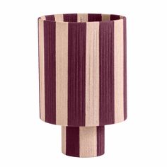 a purple and white striped lamp shade on a white background, with vertical horizontal stripes