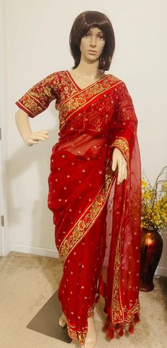 Product code-SA35 Muslin Red designer bridal Saree for Women Fancy Party Wear.Heavy zari embroidery , hand work saree with stitched embroidered Red half sleeve Blouse Falls,Picu, piping tassel work nicely done  * Saree Length: - 5.6 Meter * Blouse- stitched size 38-40  * Blouse is stitched. Saree colour-Red * Saree Comes with stitched Blouse Red Pre-draped Saree With Dupatta For Reception, Bollywood Style Red Pre-draped Saree For Reception, Bollywood Red Pre-draped Saree For Reception, Festive Red Pre-draped Saree With Zari Work, Traditional Red Pre-draped Embroidered Saree, Traditional Red Embroidered Pre-draped Saree, Traditional Red Pre-draped Saree For Reception, Red Chanderi Pre-draped Saree With Dori Work, Traditional Red Pre-draped Saree With Resham Embroidery