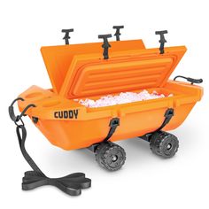 an orange cooler with wheels and handles on it's side, filled with ice