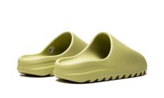 The adidas Yeezy Slide “Resin 2022” is the September 2022 release of Kanye West’s slip-on shoe in a neutral earth tone colorway.  The Yeezy Slide has been released in several “Resin” colorways over the past few years to meet the demand and popularity of the look.  The September 2022 version is darker in hue than the 2021 release, and more brownish-tan than the original green look from 2020.  As lightweight and effortlessly versatile as ever, the “Resin” is constructed from soft EVA foam for all- 2022 Shoes, Adidas Yeezy Slide, Yeezy Slides, Exclusive Sneakers, Nike Dunk High, September 2022, Nike Shox, Air Jordan 3, Nike Air Max Plus