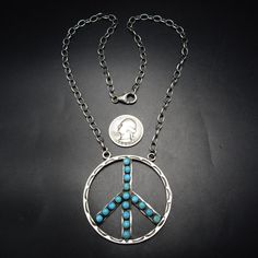 SOUTHWESTERN STERLING SILVER and TURQUOISE PEACE SIGN NECKLACE  DESCRIPTION:  This groovy necklace will be a treasured addition to your collection of fine Southwestern and Native American jewelry. MEASUREMENTS:  Necklace measures 20" end to end Pendant measures 2 1/8" across WEIGHT:  26.4 grams SIGNED: no STERLING:  yes, stamped STERLING Jewelry Measurements, Peace Sign Necklace, Cowgirl Jewelry, Sign Necklace, Wedding Jewellery Necklace, Denver Co, American Jewelry, Hippie Chic, Native American Jewelry