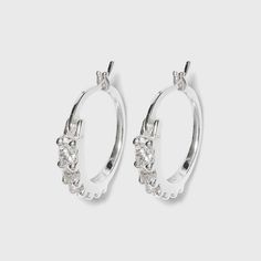 Bring sparkle and shine to your casual and dressed-up looks with these Women's Sterling Silver Cubic Zirconia Hoop Earring - Silver. Featuring the classic hoop design that hugs your earlobes perfectly, these silver-finished hoop earrings are designed with studded zirconia crystal accents that add the perfect touch of shine to your looks. Elegant and timeless, these earrings can be worn on their own for a sparkly flair or stacked with other stone-studded huggies for a more balanced ensemble. Gend Turkey Shopping, Cubic Zirconia Hoop Earrings, Amazon Jewelry, Candle Pedestal, Sporty Dress, Earring Silver, Hoop Design, Nickel Free Earrings, Tassel Drop Earrings