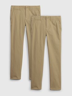 These pants are made with 5% recycled polyester.  Less waste in the world.  More great pants for you.  Soft, stretchy, twill weave.  Button at center front Kids Uniform, Kids Uniforms, British Khaki, Boys Uniforms, Twill Weave, Gap Kids, Recycled Cotton, Tan Brown, Khaki Pants