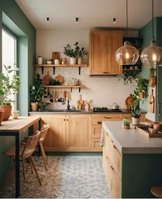 a kitchen with green walls and wooden cabinets