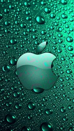 an apple logo is shown on a green surface with water droplets around it and the words,