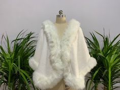 Faux Fur Fabric Wedding Faux Fur Material >>Fabric : Faux Fur >>Color : Ivory,white,Black >>Size : One size fits all If you need a larger size, Please contact us before purchase Transportation time in Europe and America: 15-25 working days, Other countries: 20-35 working days White Faux Fur Party Outerwear, White Faux Fur Outerwear For Party, White Formal Outerwear For Winter, Cream Winter Wedding Outerwear, Elegant White Faux Fur Outerwear, Winter Wedding Faux Fur Outerwear, Faux Fur Outerwear For Winter Wedding, Chic Winter Wedding Outerwear, White Fall Wedding Outerwear