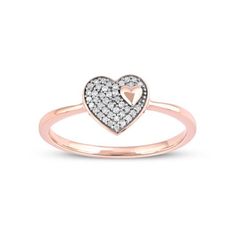 Crafted in 10k gold this diamond fashion ring features a heart frame, set with shimmering round diamonds, at the center. A small puffed heart sits inside this frame. The shank of the ring is finished to a bright polished shine. Simple yet stylish, this heart ring is sure to catch attention. Size: 7.5.  Color: Pink.  Gender: female.  Age Group: adult. Diamond Fashion Rings, Puffed Heart, Rose Gold Heart, Heart Frame, Girly Accessories, Fashion Ring, Gorgeous Jewelry, Diamond Fashion, Frame Set