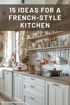 a kitchen with lots of white cabinets and wooden counter tops that have pots, pans, and utensils on them