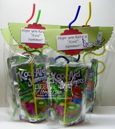 three bags of fruit with tags on them