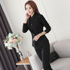 This Wonderful Two Piece Ladies Formal Pant Suit is a perfect blend of sophistication and style. Adorned with an interesting uniform design for a fabulous look, this elegant blazer is crafted of high-quality polyester and spandex material composition, giving you a perfect fit along with comfort. Well tailored for a seamless fit and feel, it features a shawl collar and a timeless single button closure for added convenience. Choose this to mark a bold style statement.

Specifications
 Gender: Wome Blazer Uniform, Formal Pant Suit, Winter Wear For Men, Formal Pant Suits, Formal Pant, Suits Black, Winter Wear Women, Mens Wool Coats, Elegant Blazers